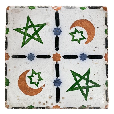 Lot 71 - A Middle Eastern tin glazed pottery tile.