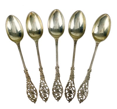 Lot 210 - A set of Victorian silver teaspoons by William Comyns & Sons.