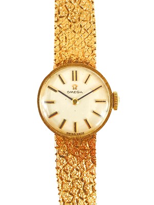 Lot 169 - An Omega 9ct gold lady's manual wind bracelet wristwatch.