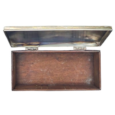 Lot 219 - An Edwardian silver cigarette box Wakely & Wheeler.