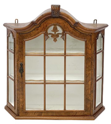 Lot 396 - A late 19th century Dutch burr walnut wall hanging display cabinet.