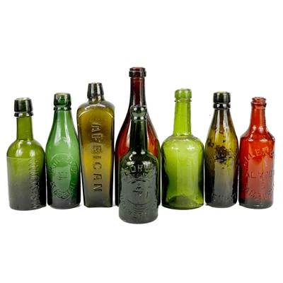 Lot 136 - A collection of eight beer and other bottles.