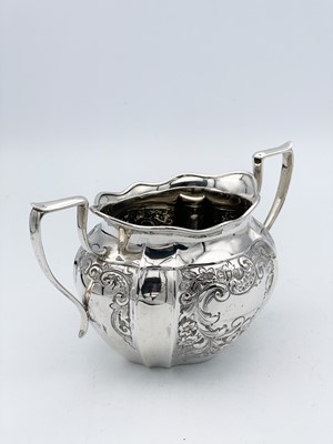 Lot 228 - A late Victorian four-piece silver tea set by William Hutton & Sons Ltd.