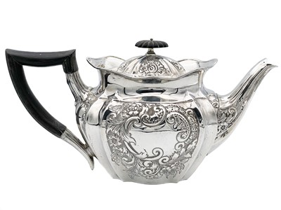 Lot 228 - A late Victorian four-piece silver tea set by William Hutton & Sons Ltd.