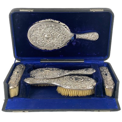 Lot 203A - A good Edwardian silver five piece cased dressing table set by Samuel Walton Smith.