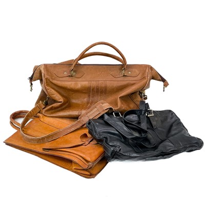 Lot 176 - A brown leather holdall.