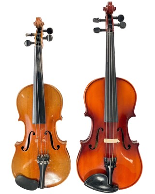 Lot 7 - Two cased violins
