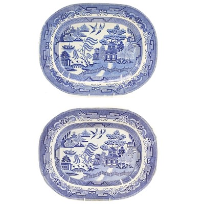 Lot 237 - Two 19th century blue and white Staffordshire willow pattern meat platters.