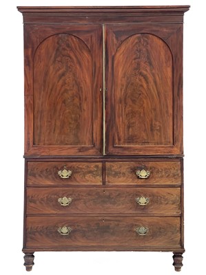 Lot 447 - A George III mahogany linen press.