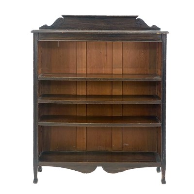 Lot 386 - An Arts and Crafts oak low bookcase.