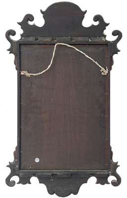Lot 391 - A George III mahogany fretwork mirror.