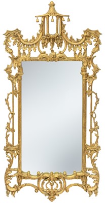 Lot 460 - A Chinese Chippendale style carved wood and gilt gesso mirror.