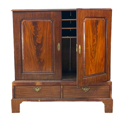 Lot 668 - A 19th century mahogany linen press.