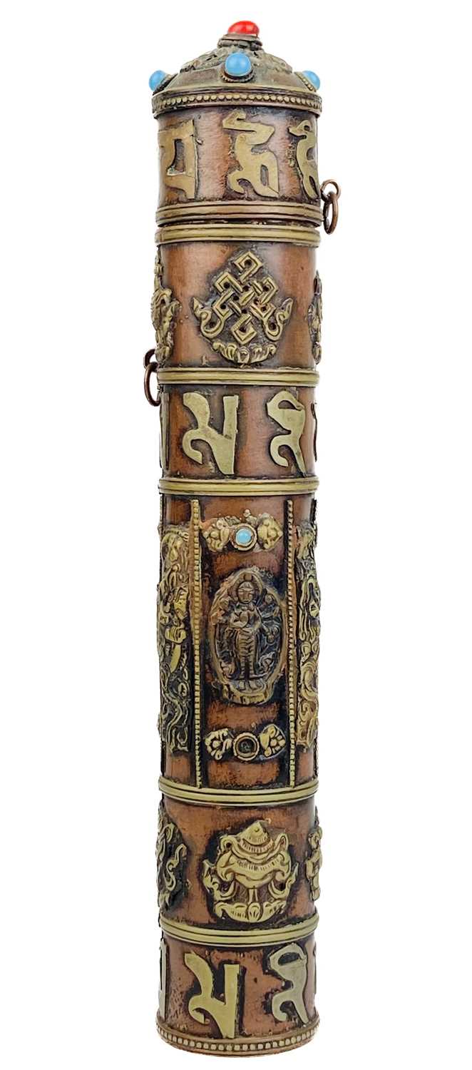 Lot 1321 - A Tibetan copper scroll holder, early 20th century.