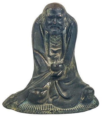 Lot 1324 - A Chinese metal figure of a lohan, early 20th century.