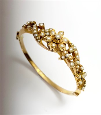Lot 2507 - A 9ct gold Victorian hinged bracelet set with...