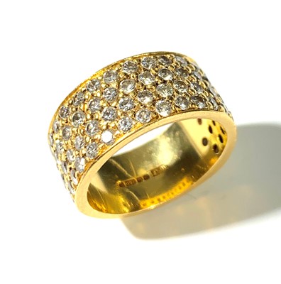 Lot 2508 - An18ct gold wide band ring set with five hoop...