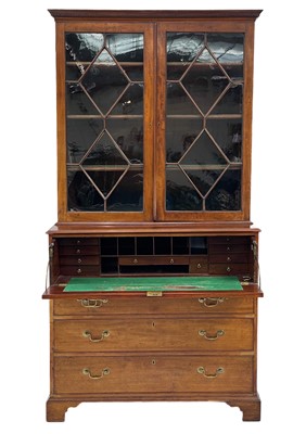 Lot 452 - A George III mahogany secretaire bookcase.