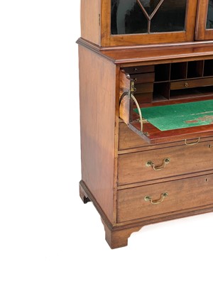 Lot 452 - A George III mahogany secretaire bookcase.