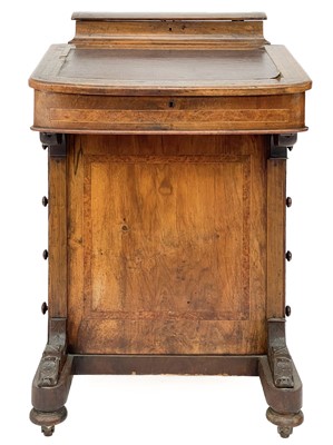 Lot 383 - A Victorian walnut Davenport.