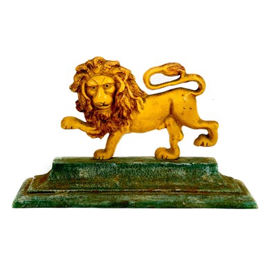 Lot 149 - A cast metal doorstop in the form of a lion