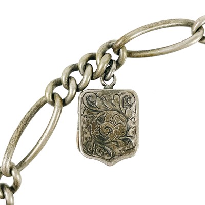 Lot 99 - A silver Albert watch chain applied with two charms and a fob vesta.