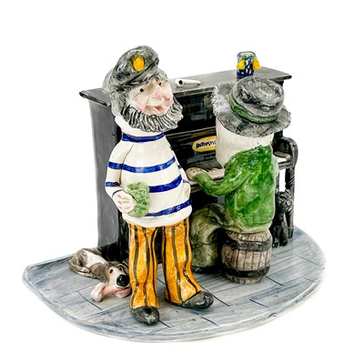 Lot 321 - Alan Young, A Studio pottery figure group.