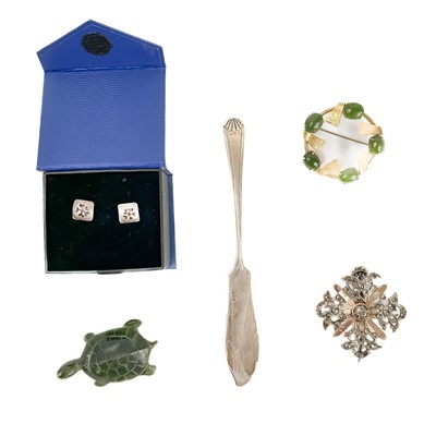 Lot 406 - Two brooches, a silver butterknife, a pair of earrings and a carved hardstone turtle.