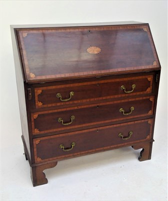 Lot 3501 - A George III style mahogany bureau, with...