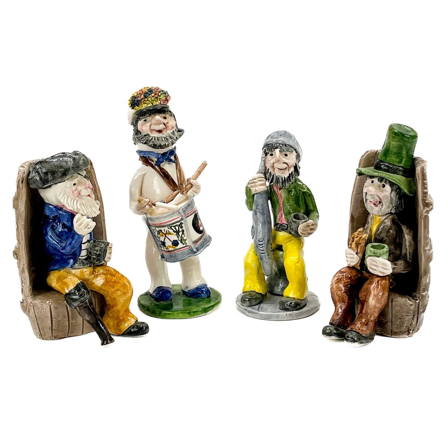 Lot 318 - Four Alan Young Studio pottery figures.