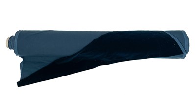 Lot 202 - A bolt of dark blue velvet fabric.