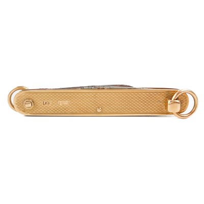 Lot 97 - A 9ct gold cased folding combination pocket knife fob.