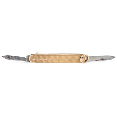 Lot 97 - A 9ct gold cased folding combination pocket knife fob.