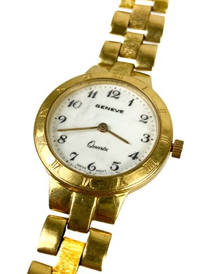 Lot 186 - A Geneve 18ct gold lady's quartz bracelet wristwatch.