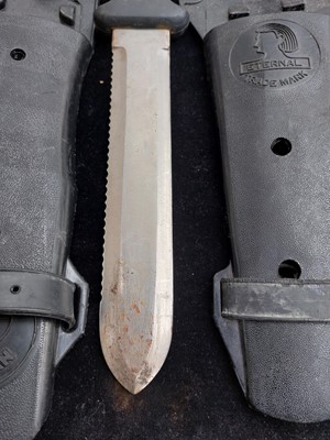 Lot 131 - Two Japanese Eternal stainless steel divers knives.