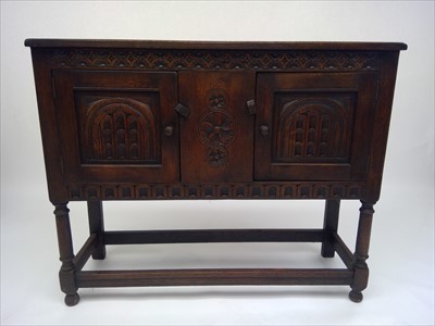 Lot 3448 - A Jacobean style oak livery cupboard, with a...