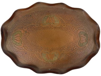 Lot 94 - A J & F Pool Ltd copper oval tray repousse decorated with foliate rim.