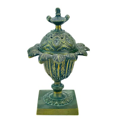 Lot 11 - A Regency bronze pastille burner and cover.