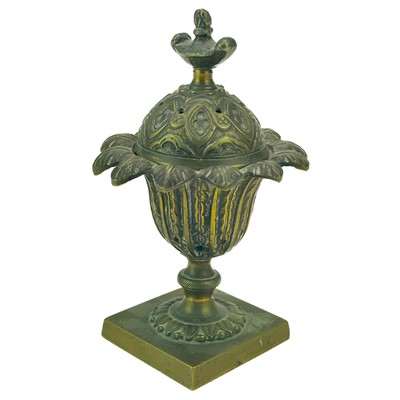 Lot 11 - A Regency bronze pastille burner and cover.