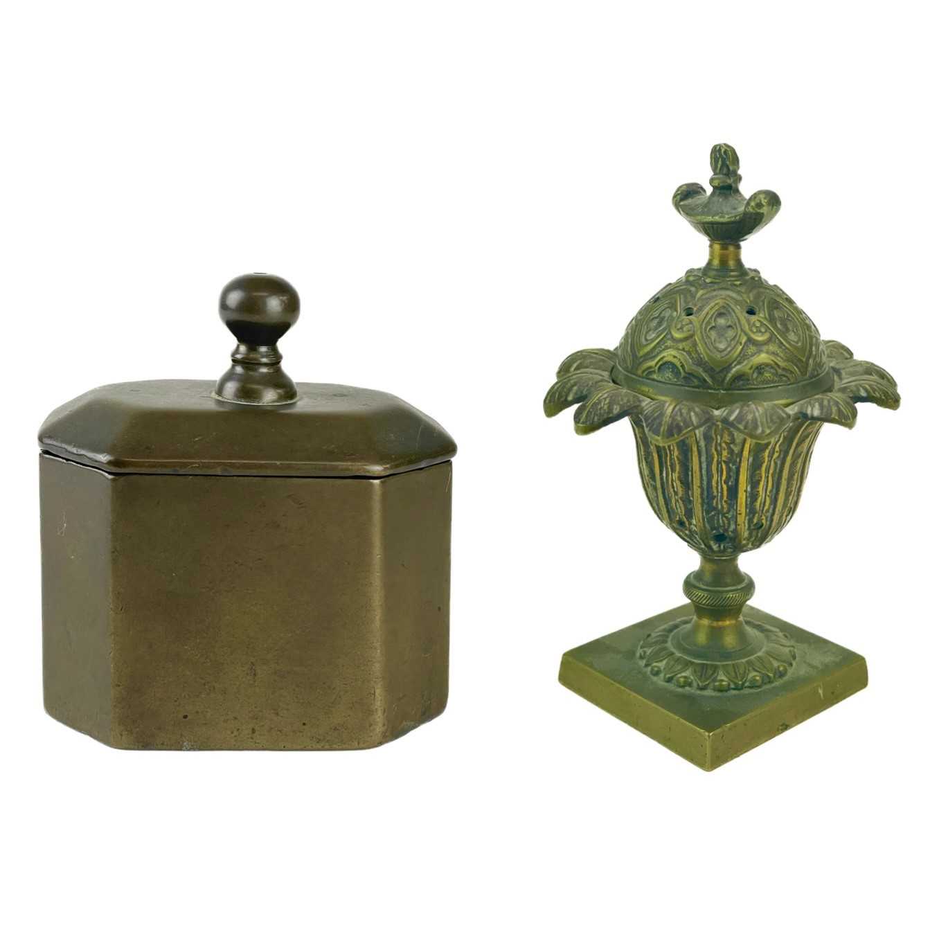 Lot 11 - A Regency bronze pastille burner and cover.