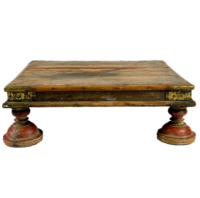 Lot 49 - An Indian brass bound wooden low table, early 20th century.