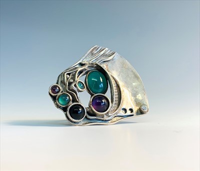 Lot 2543 - A contemporary silver craft ring set with...