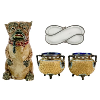 Lot 464 - A Continental Majolica pottery seated pug dog jug.