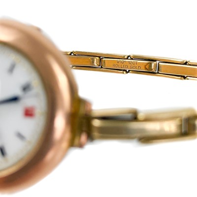 Lot 115 - Three 9ct gold-cased lady's manual wind wristwatches and a 9ct expanding bracelet.