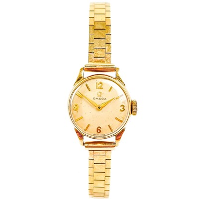 Lot 190 - An Omega 1950's 9ct gold-cased lady's manual wind bracelet wristwatch.