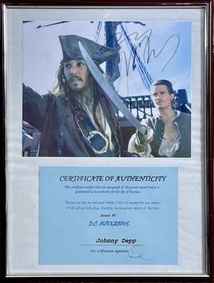 Lot 274 - (Signed) Johnny Depp.