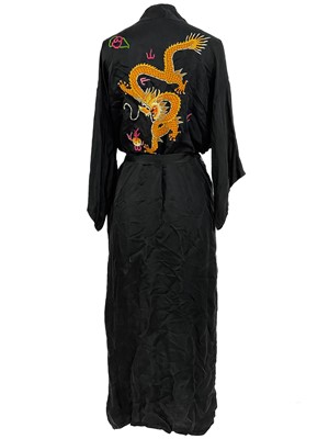 Lot 1423 - A Chinese black silk dressing gown, 20th century.