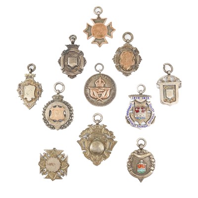 Lot 68 - A collection of eleven hallmarked silver shield fobs.