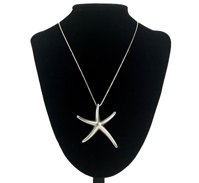 Lot 571 - A Tiffany & Co Elsa Peretti sterling silver starfish pendant and chain.