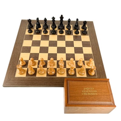 Lot 97 - A Jaques Staunton turned box and ebony weighted chess set.